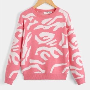 pink weird print crew neck
